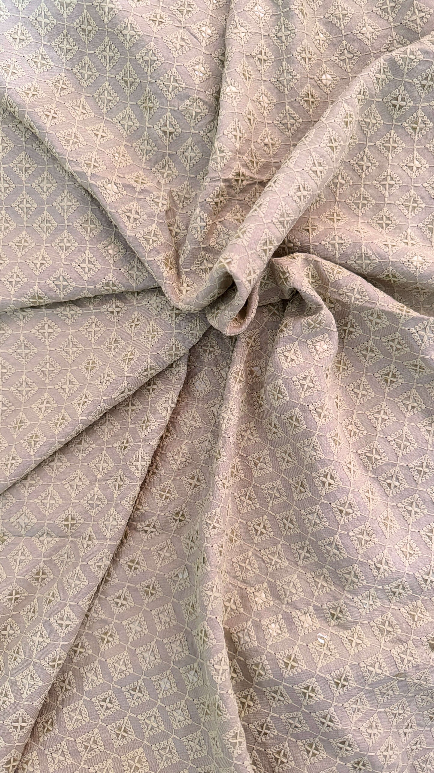 Close-up of gray fabric with a subtle pattern