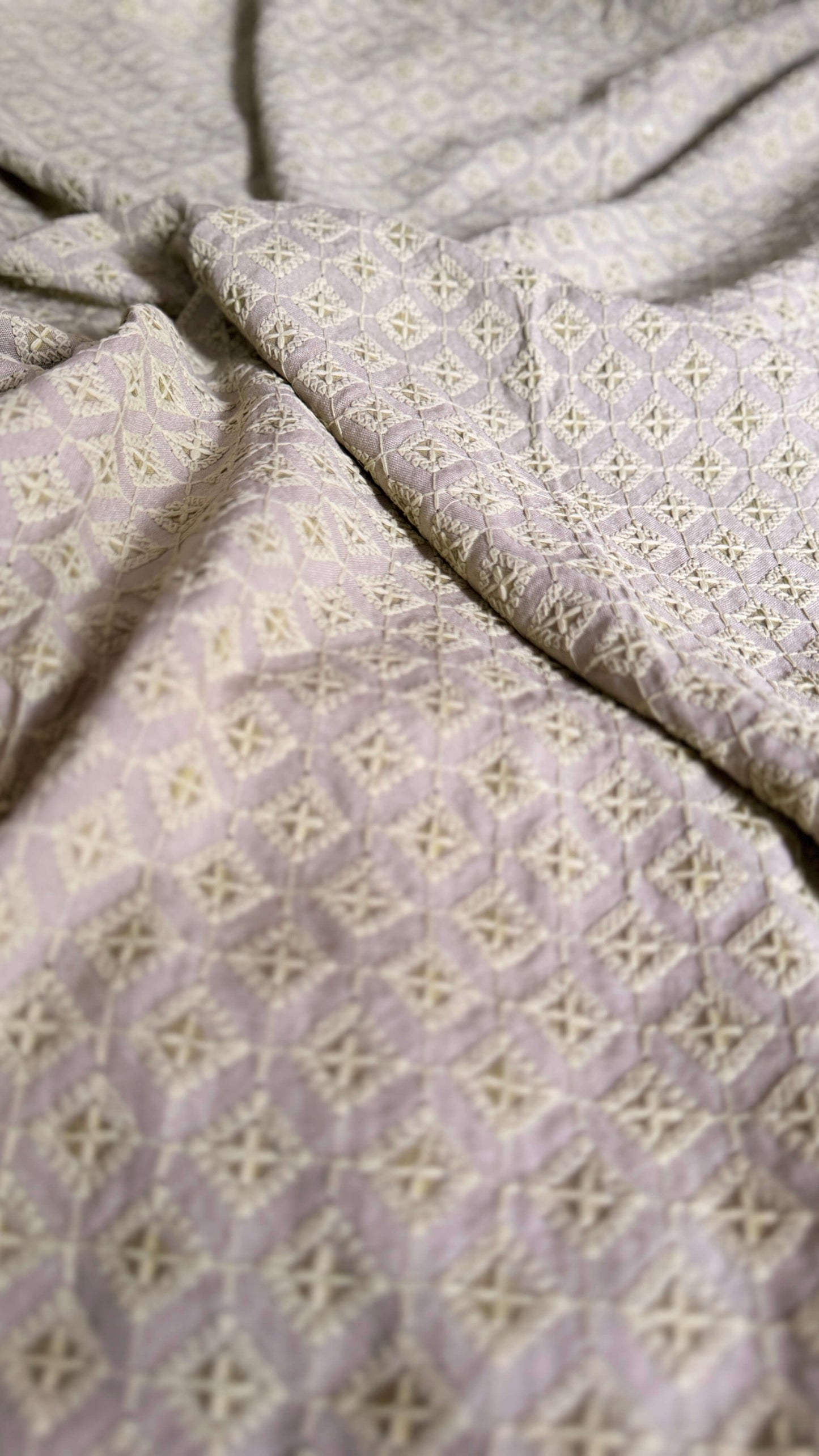 Close-up of textured fabric with a subtle pattern