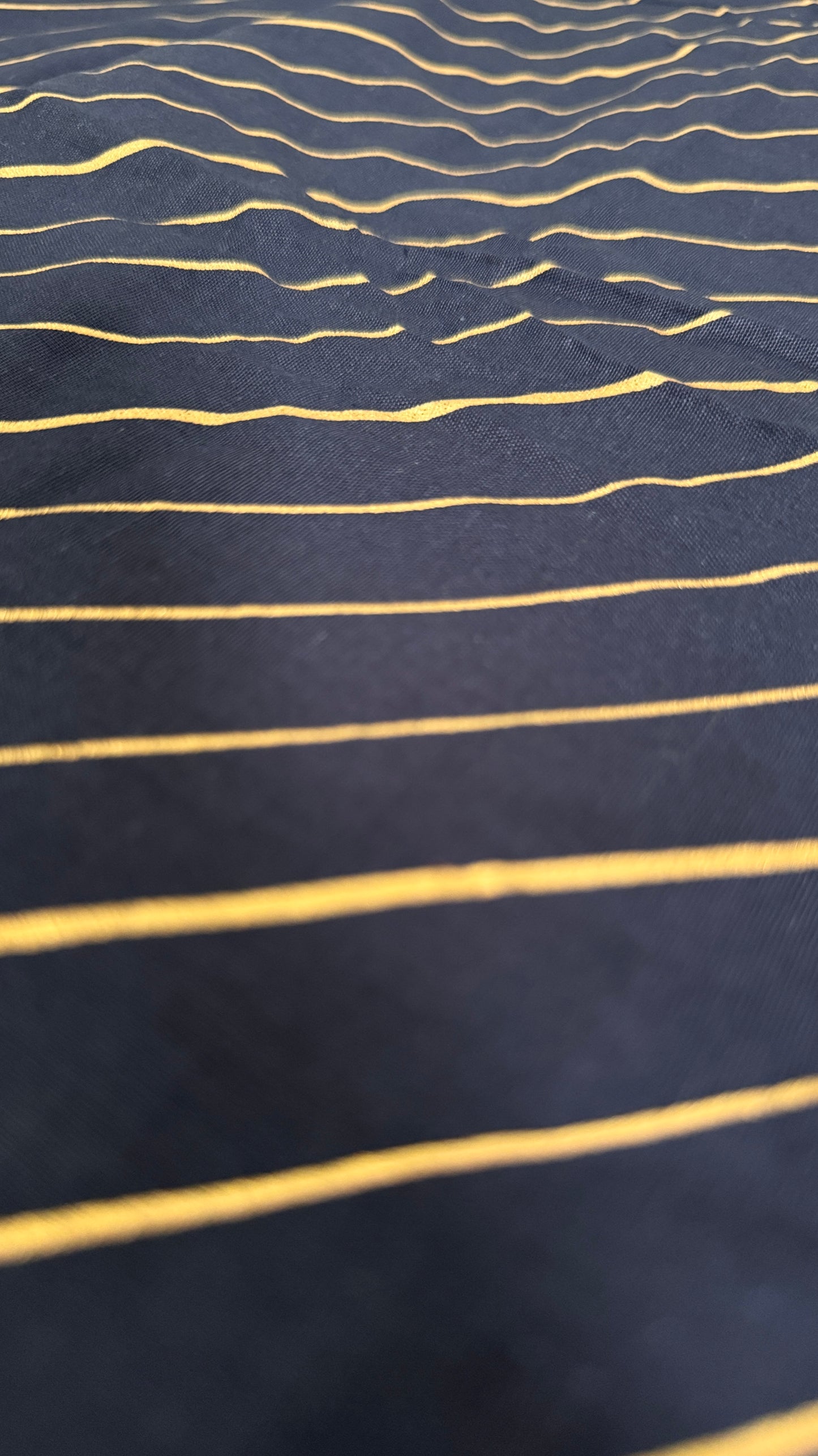 Navy fabric with gold stripes
