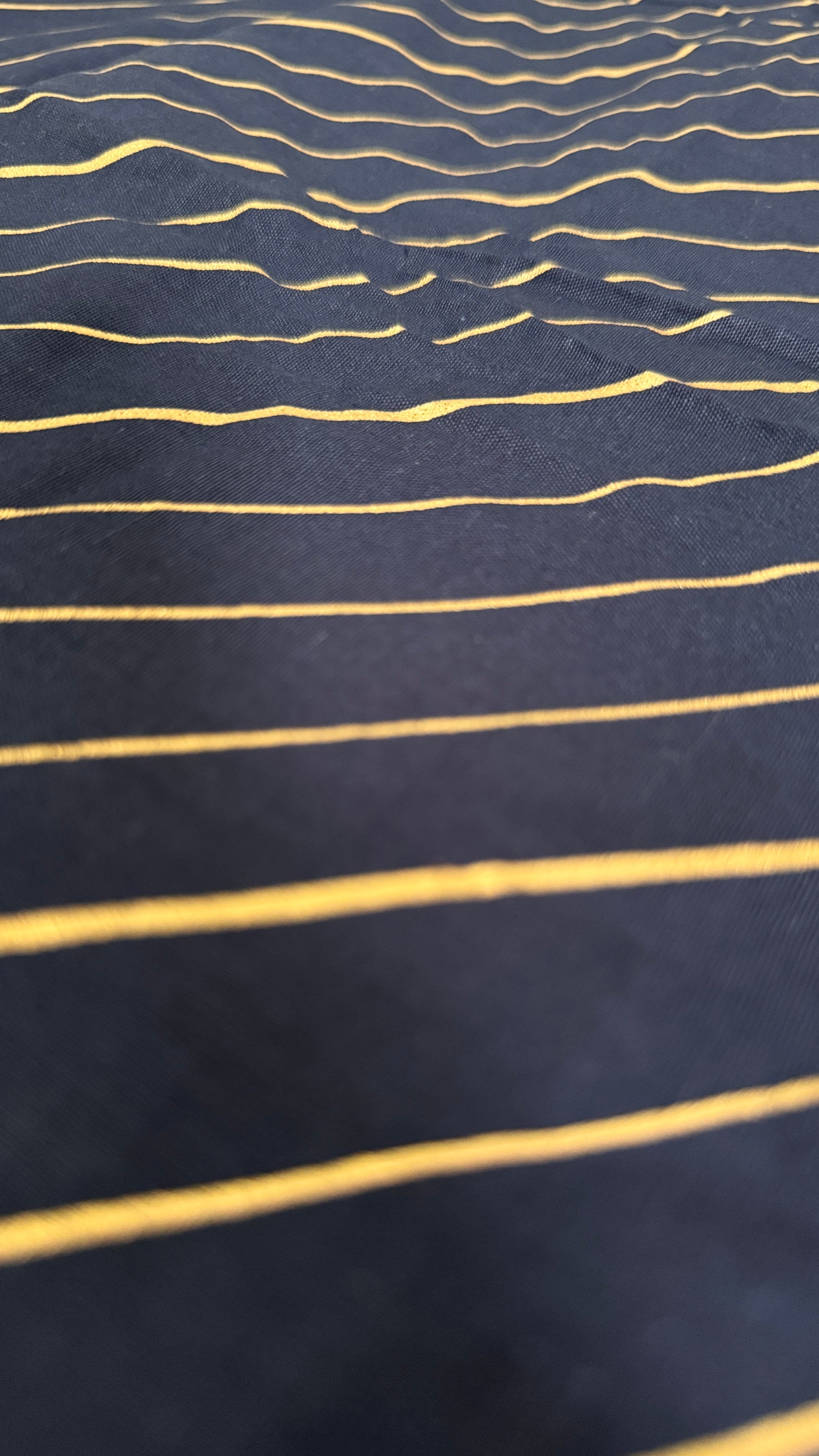 Navy fabric with gold stripes