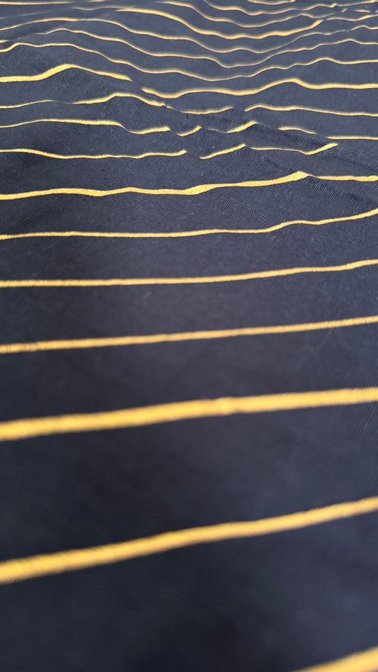 Navy fabric with gold stripes