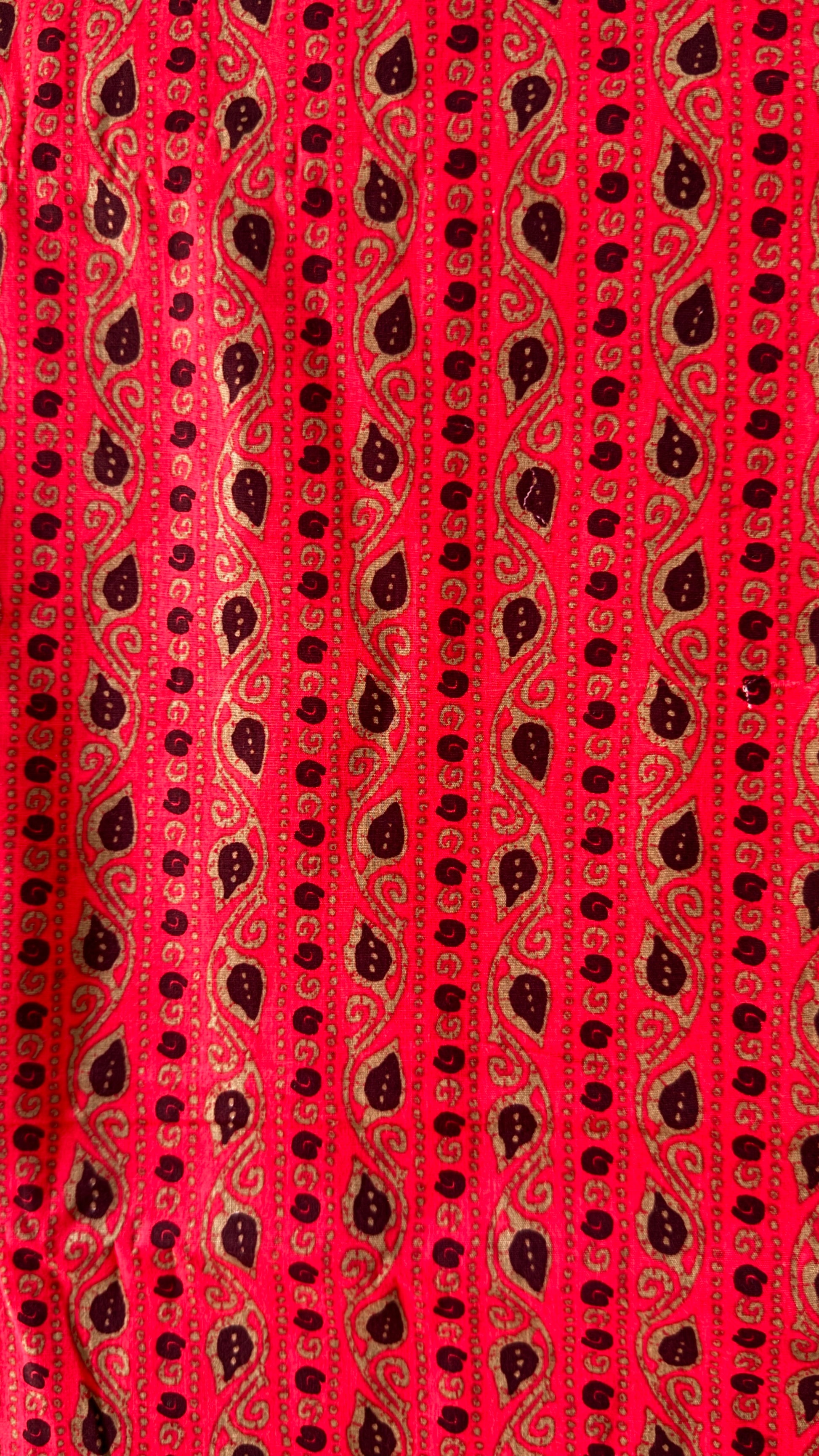 Red fabric with black pattern