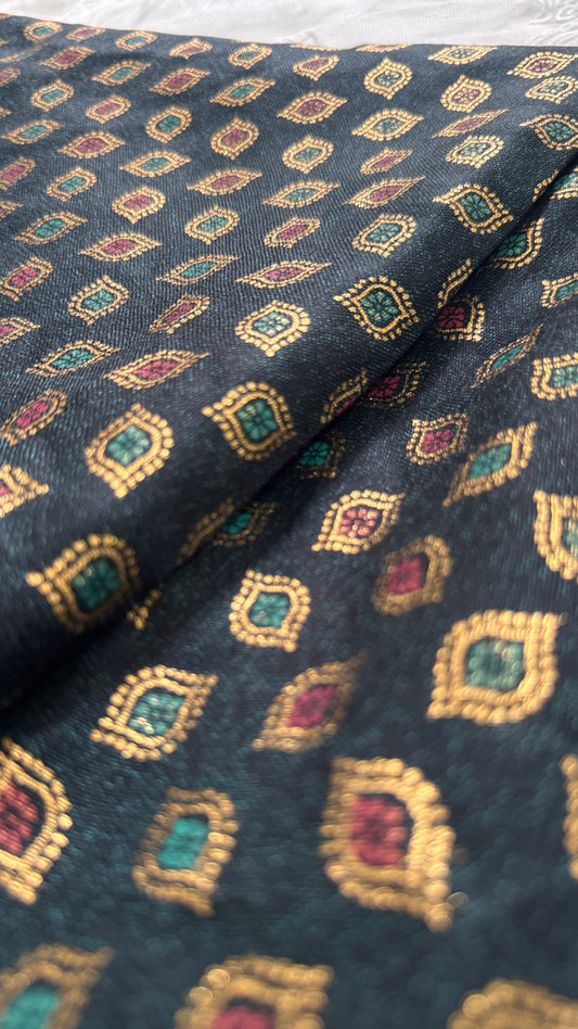 Patterned fabric with geometric design on a dark background