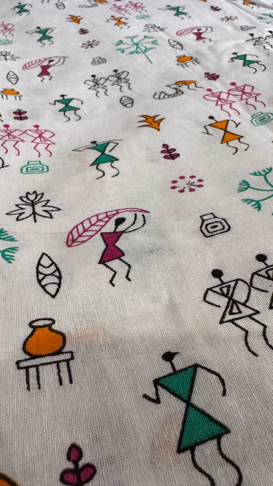 Fabric with colorful abstract designs of people and objects on a white background