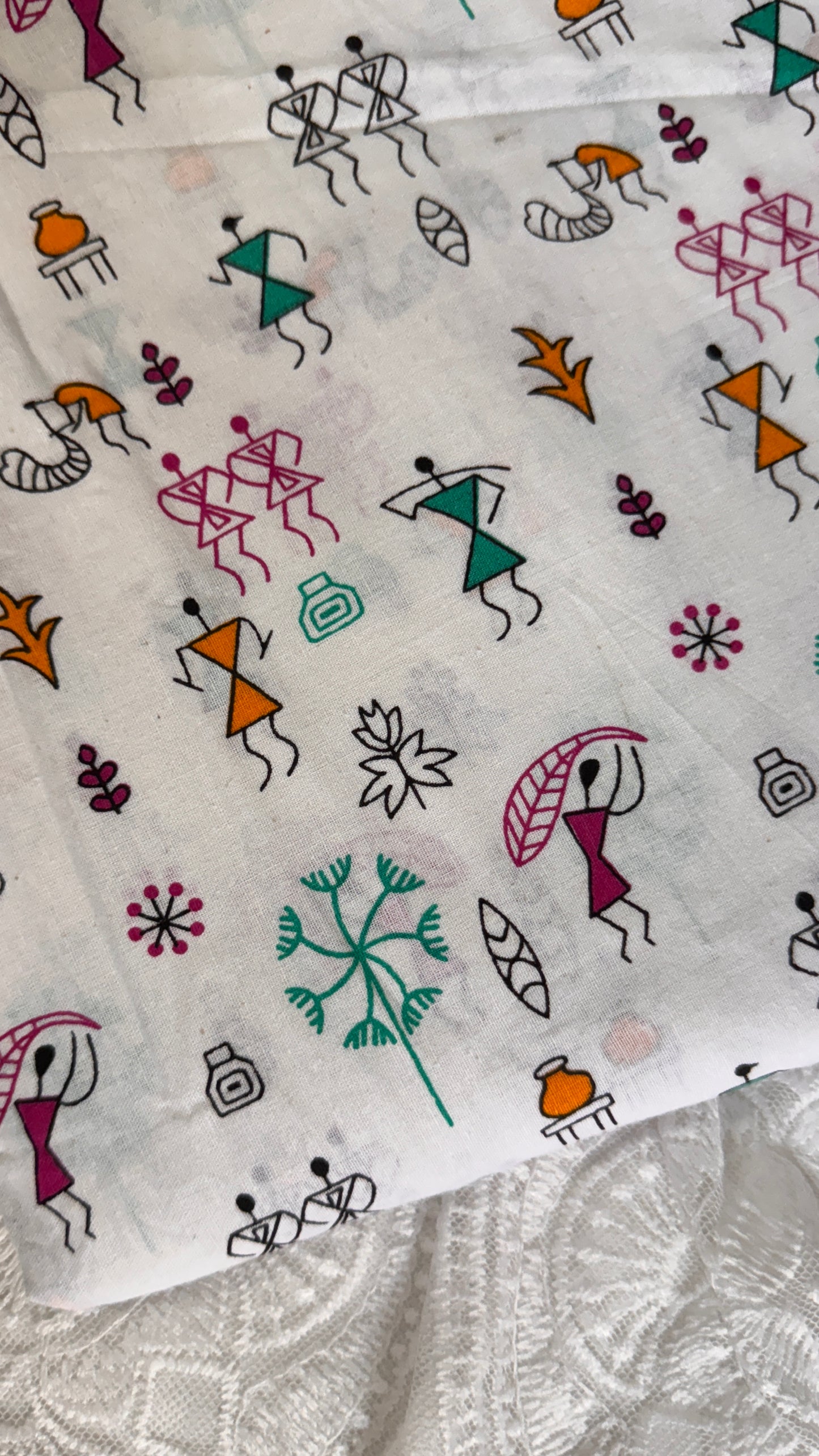 Patterned fabric with abstract figures and shapes on a white background