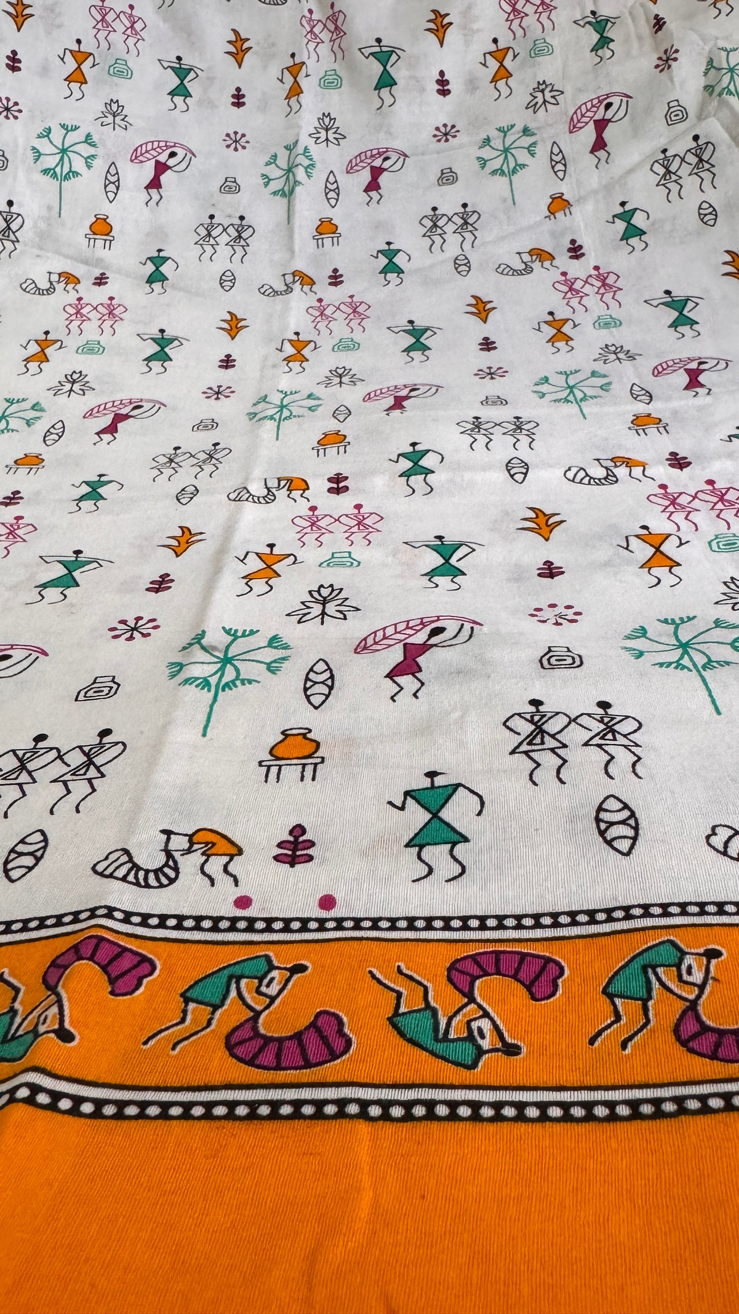 Decorative fabric with colorful hand-drawn patterns on a white background