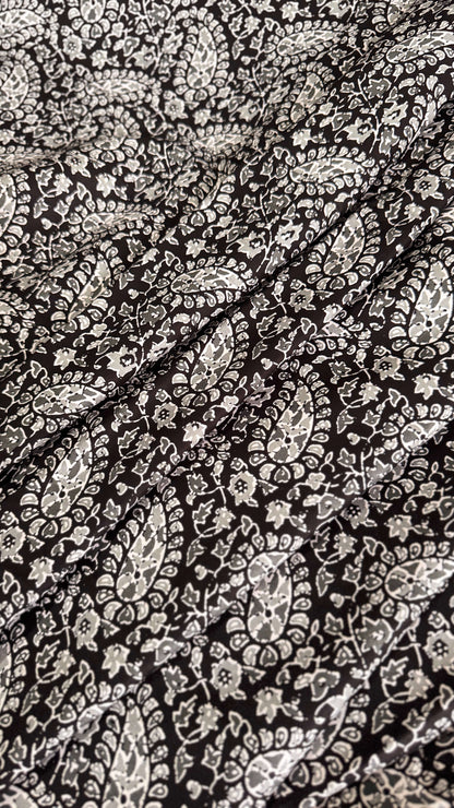 Close-up of black and white paisley pattern fabric