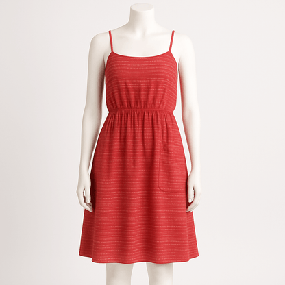Red dress on a mannequin against a white background