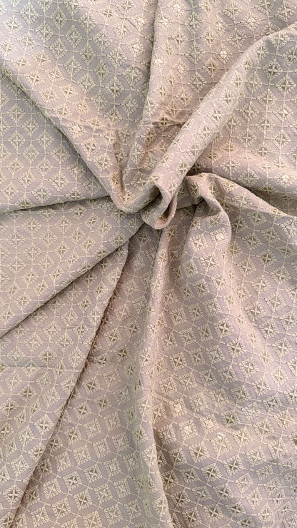 Close-up of gray fabric with a subtle pattern