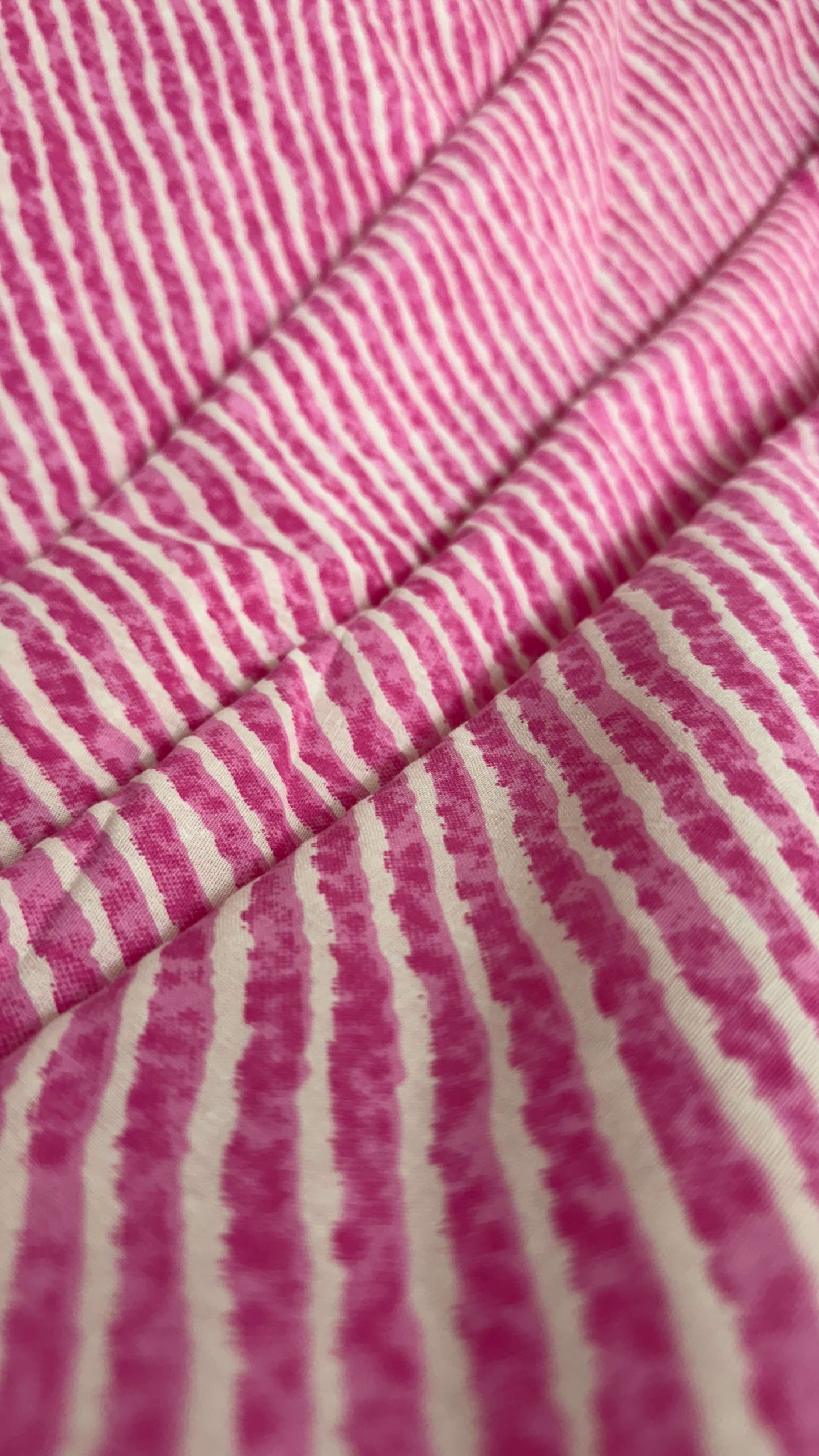 Close-up of pink and white striped fabric