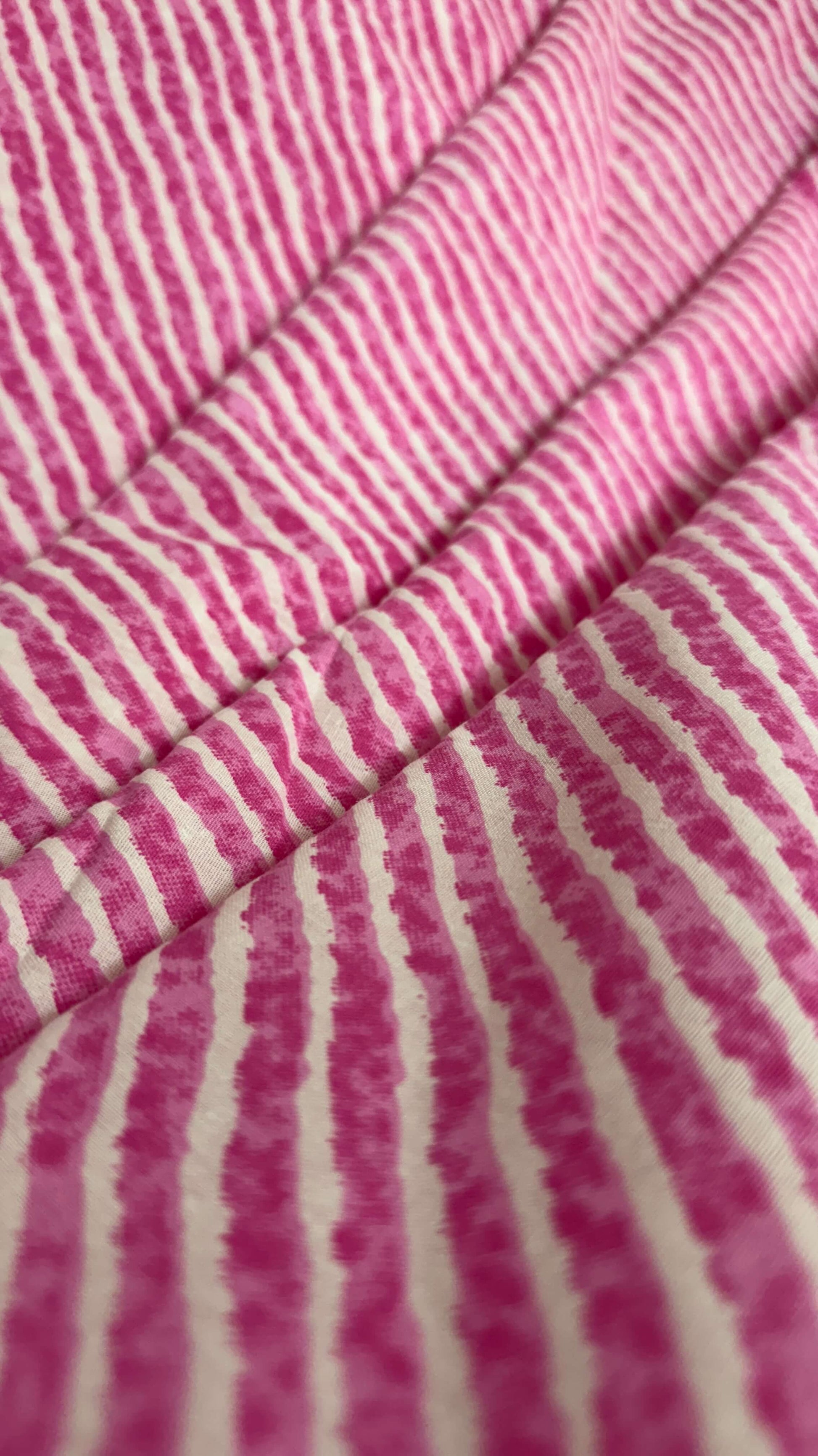 Close-up of pink and white striped fabric