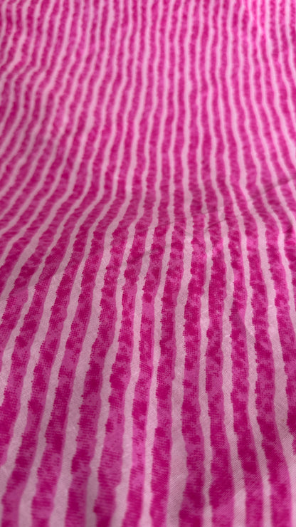 Close-up of pink fabric with white stripes