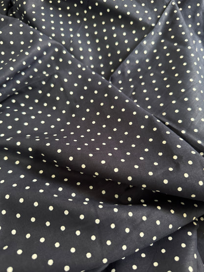 Blue fabric with white polka dots