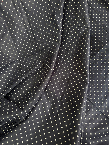 Blue fabric with white polka dots